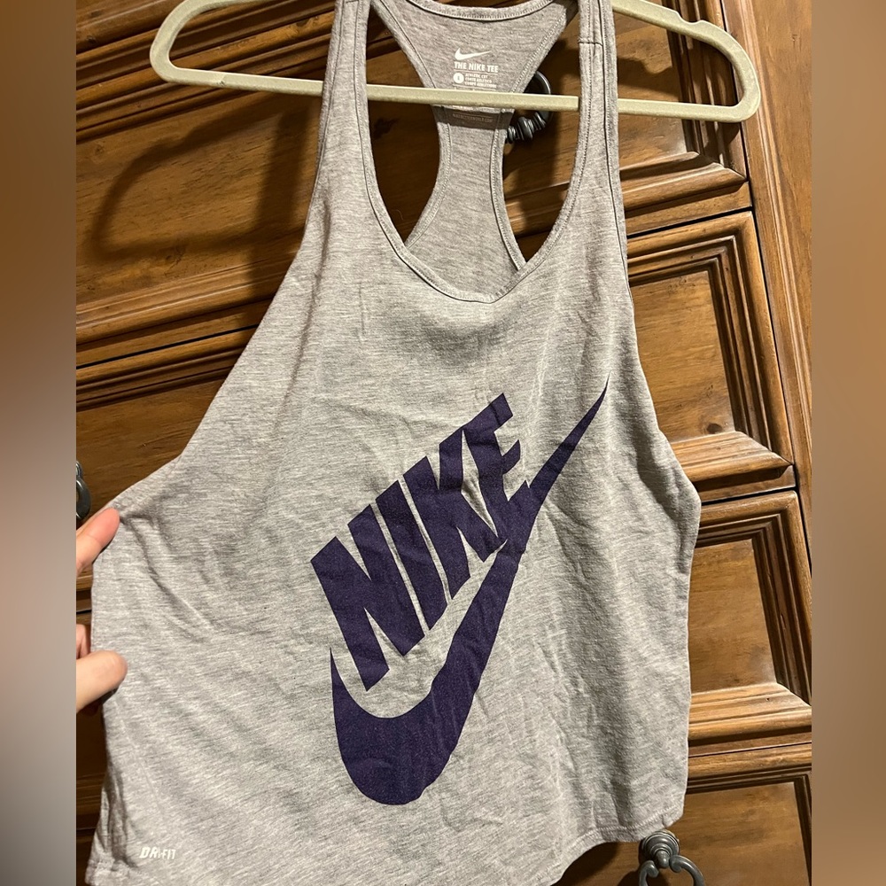 Gently used Nike Dri fit muscle 💪 tank Gray with Purple